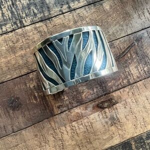 Brighton Silver Women's Cuff Bracelet with reversible leather backing.